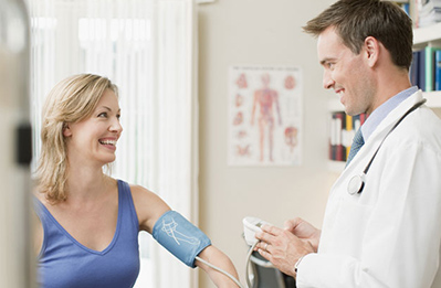 Physician listening to patient's heart