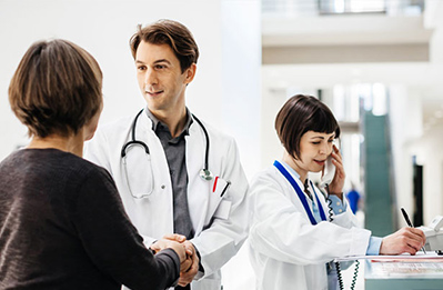 Physician listening to patient's heart