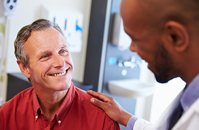 Physician listening to patient's heart