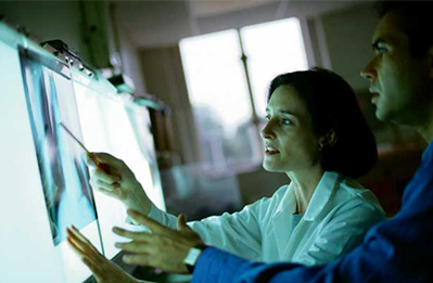 Physician listening to patient's heart